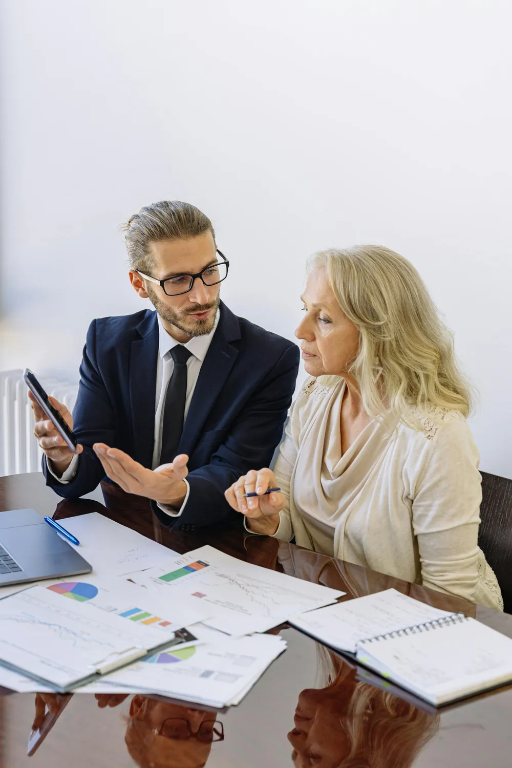 A financial advisor meeting with a client to understand their goals