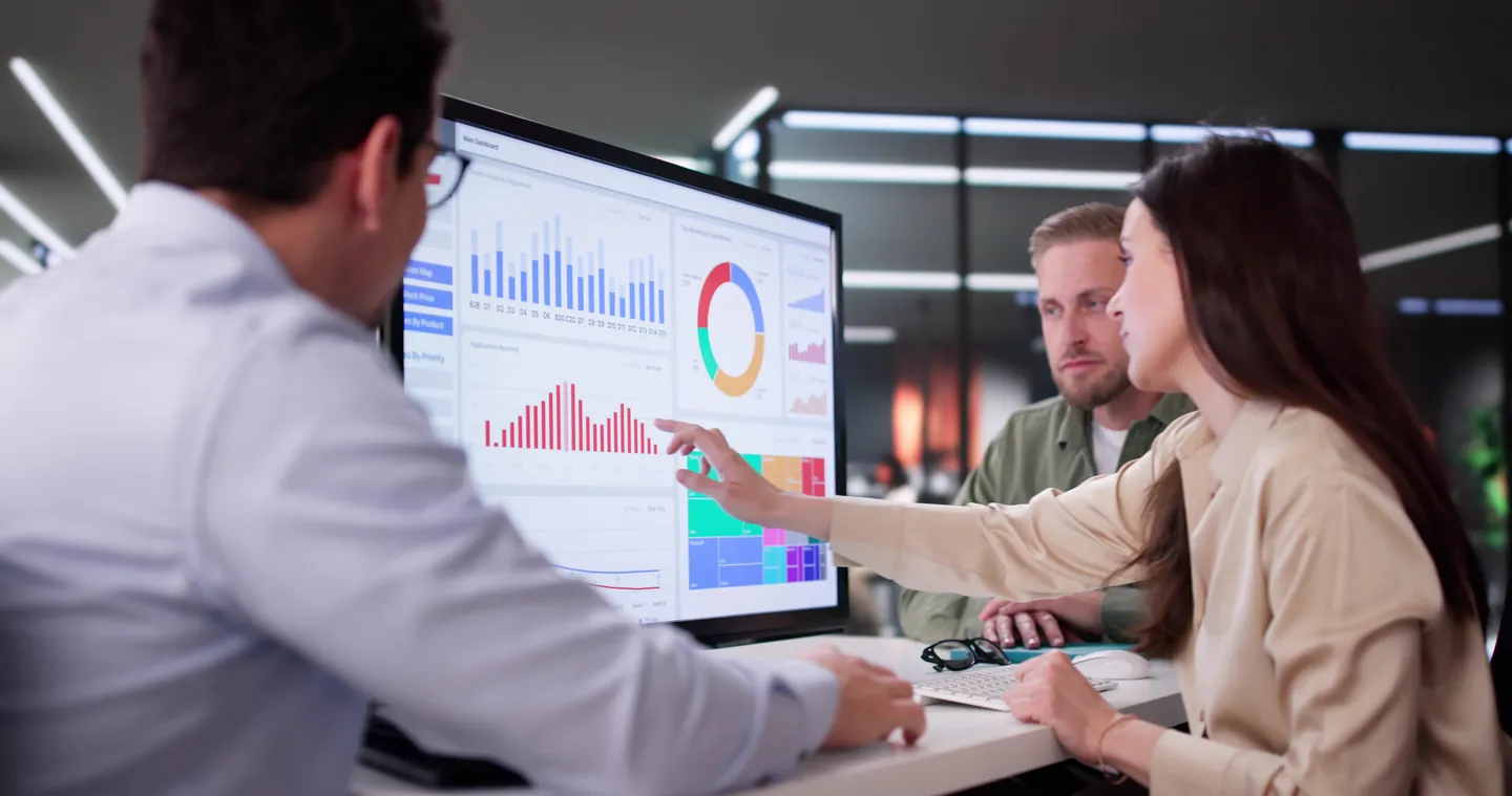 An advisor walking through financial projections and charts on screen